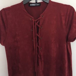 A deep red lace up dress