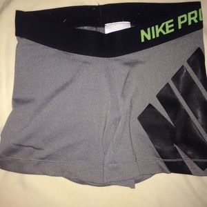 Grey and black Nike Pro Dri-fit athletic shorts