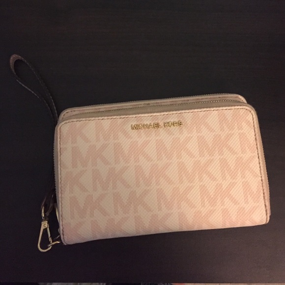 Brand new Michael Kors Adele Wristlet.
