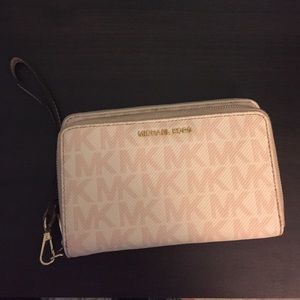 Brand new Michael Kors Adele Wristlet.