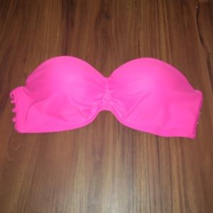 Pink bathing suit top.