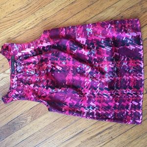 Silky textured sleeveless tank.