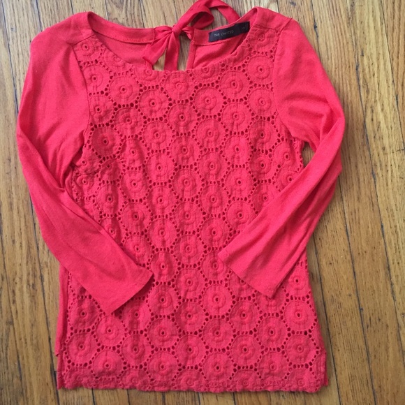 Three quarter length orange top