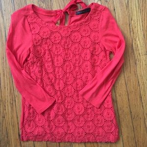 Three quarter length orange top