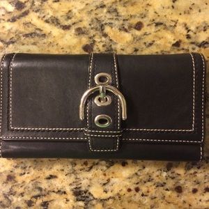 Leather coach wallet with silver buckle