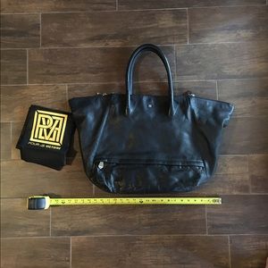 Pour la Victoire large leather tote with dust bag