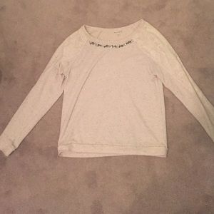 Cream sweater with jewels and lace details