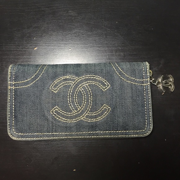 Used denim and gold wallet