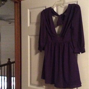 Deep v, open back, purple dress