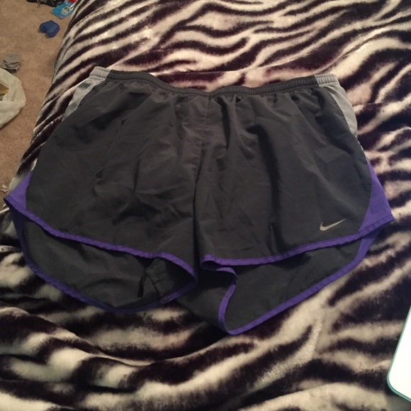 Dark gray Nike shorts with purple