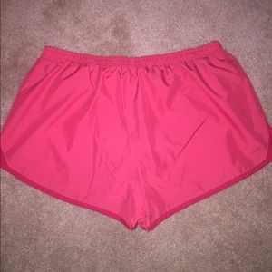Pink Nike shorts