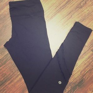 Black leggings with ruffle detail