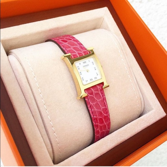 *SOLD* Hermes hour PM In fuschia croco GHW
