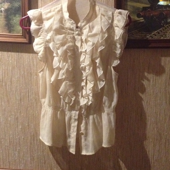 Cream colored short sleeve blouse