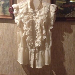 Cream colored short sleeve blouse