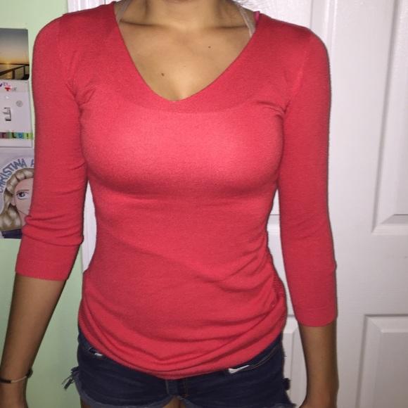 Orange, tight sweater