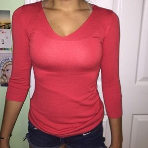 Orange, tight sweater