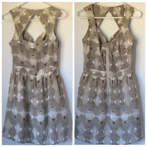 Greylin Dresses & Skirts - Greylin Abstract Print Triangle Cut Out Dress