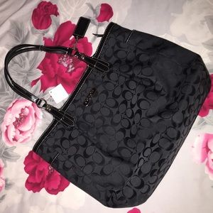 Never used Coach bag. NEW CONDITION