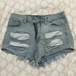 Destroyed denim shorts