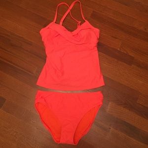 Hot pink tankini with matching bottom.