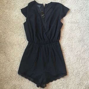 Bebe black romper