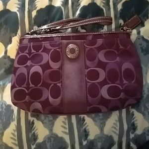 Purple Coach wristlet