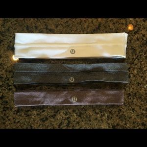 Three different width lululemon headbands (w,g,p)
