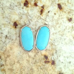 Kendra Scott turquoise and silver earrings.
