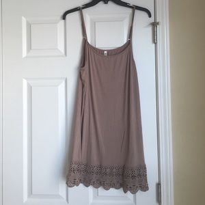 Tunic tank top with lace detail.