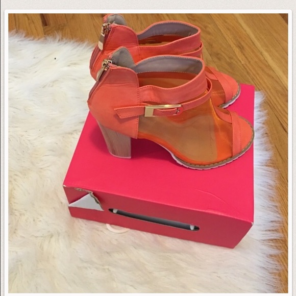 Beautiful peach colored, chunky heeled boots.