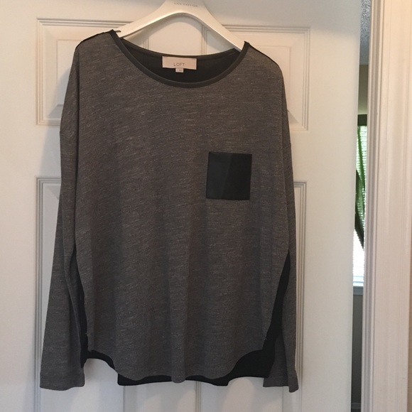 Cute long sleeve top with leather pocket