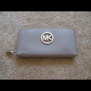MK grey zip wallet