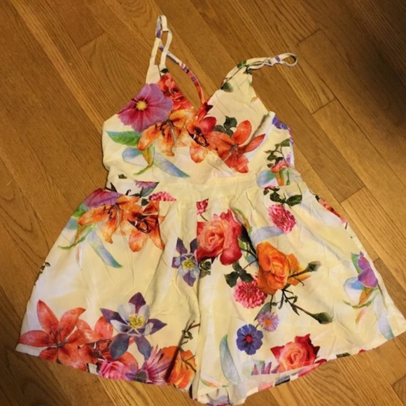 Last one left. Floral Romper.