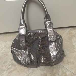 A sliver purse. Never used