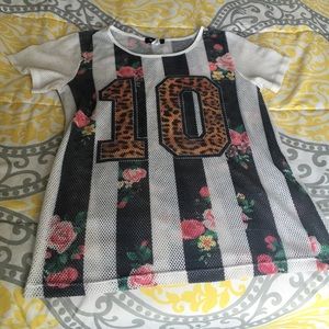 Pink, green, and black top