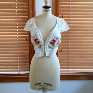 Cream cotton bolero jacket with floral embroidery