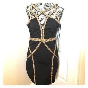 🎉Bottom ⬇️ Price 🎉 Wow Couture Black/Gold Dress!