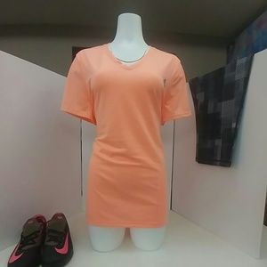 Orange workout top.    (BT1)