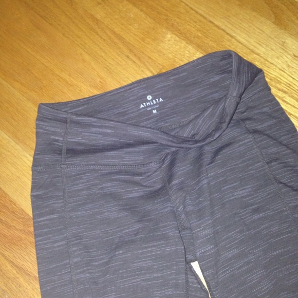 Size M Athleta leggings. Deep brown/ivory pattern.
