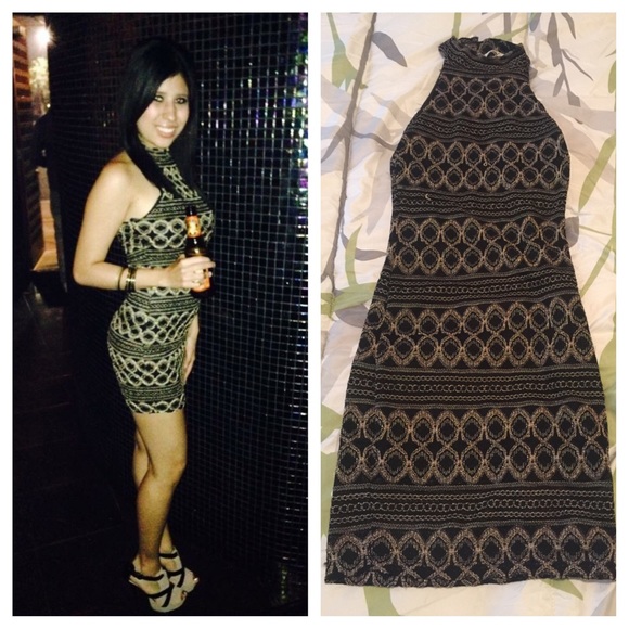 Black and gold tight fitting dress