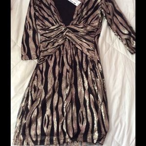 Black sequence dress with gold detail