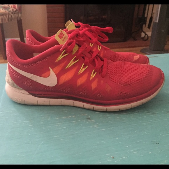 Red women's Nike 5.0 frees size 8