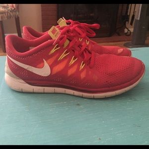Red women's Nike 5.0 frees size 8