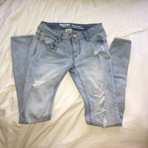 Light blue ripped jeans