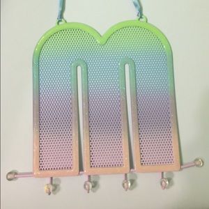 A multicolored jewelry hanger