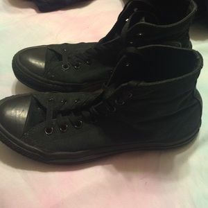 All black high tops.