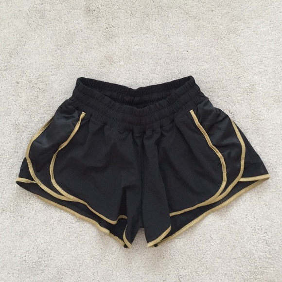 lululemon athletica Pants - Lululemon. Super Squad Shorts. Black + Gold.
