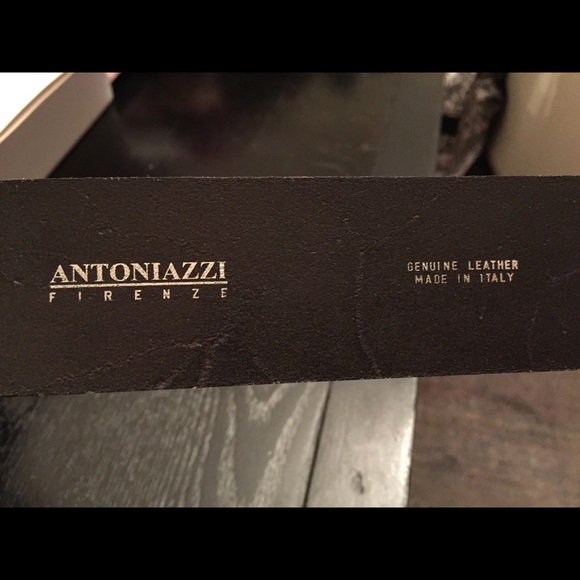 Black patent   leather belt with silver buckle