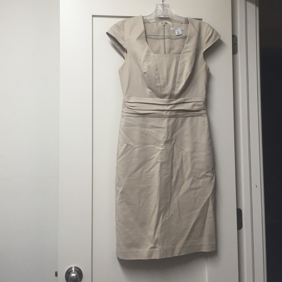 A beige formal dress, only worn twice.